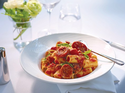 Rigatoni with Tuscan sausage in spicy tomato sauce, sprinkled with Parmesan